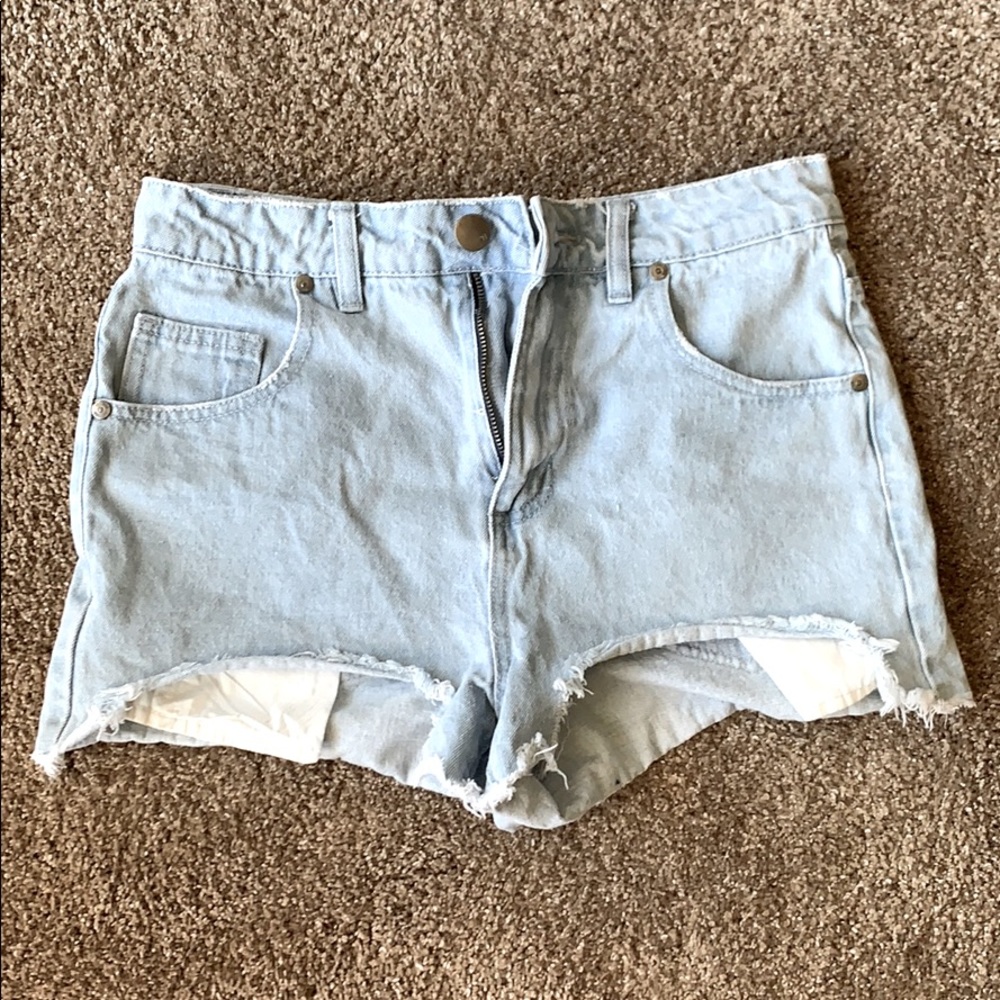 The Flash Back high-rise distressed denim shorts